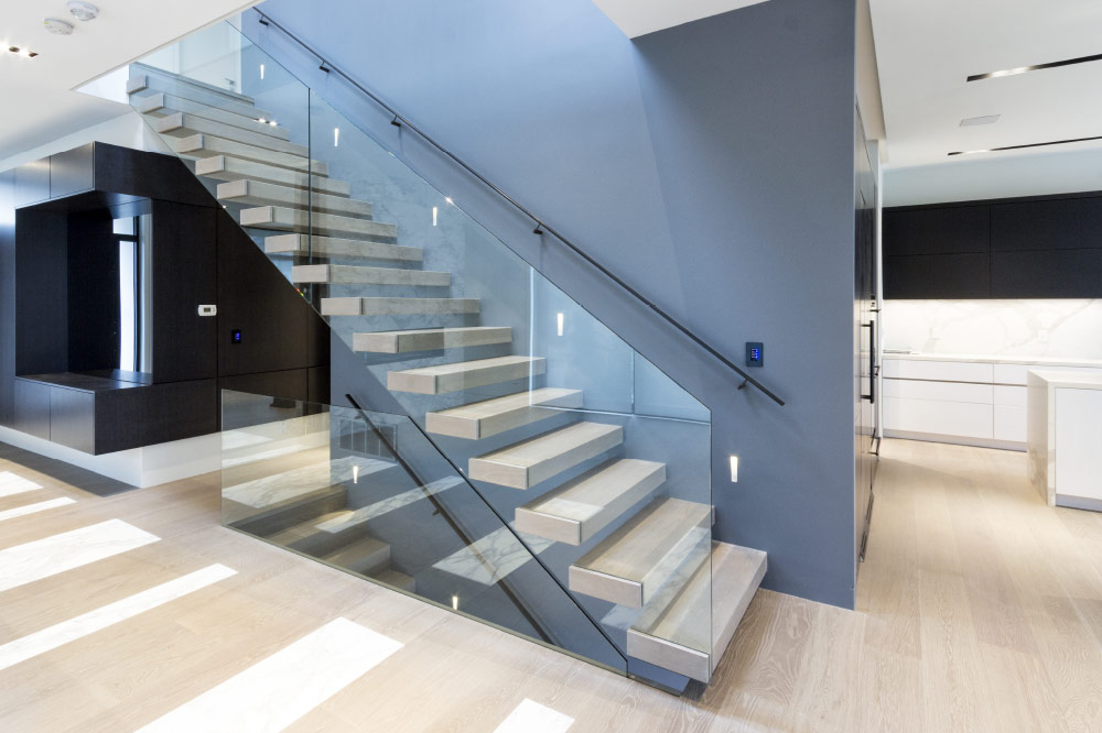 wall cantilevered / box steps / blackened steel handrail