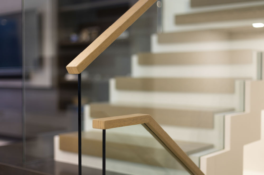 glass top mounted wood handrails