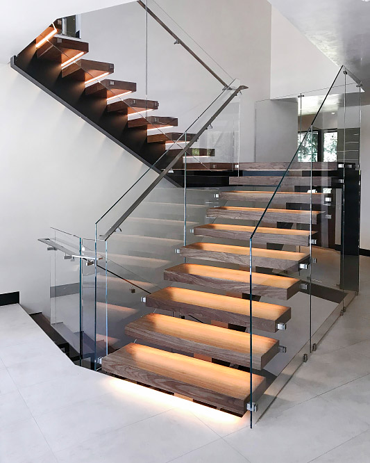 mono stringer stair / wood box steps / glass side mount handrails / rectangular aluminum handrails