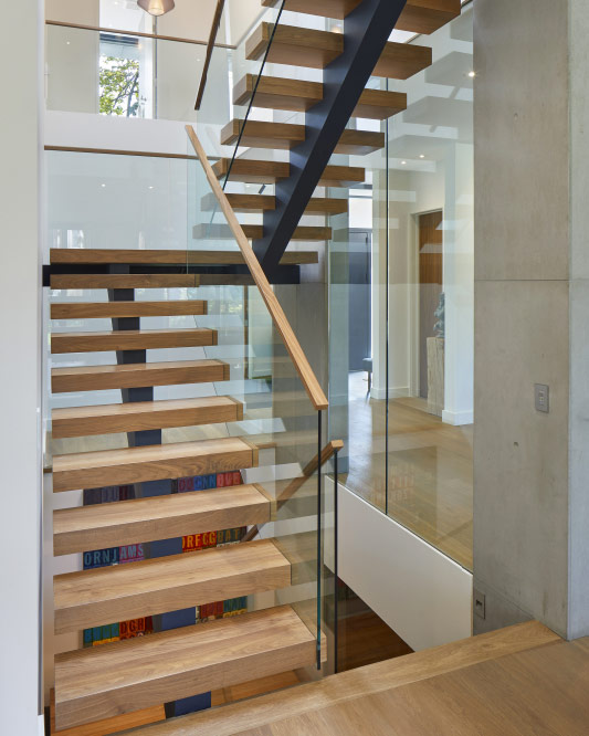 mono stringer / wood box steps / glass side mount handrails / rectangular wood handrails