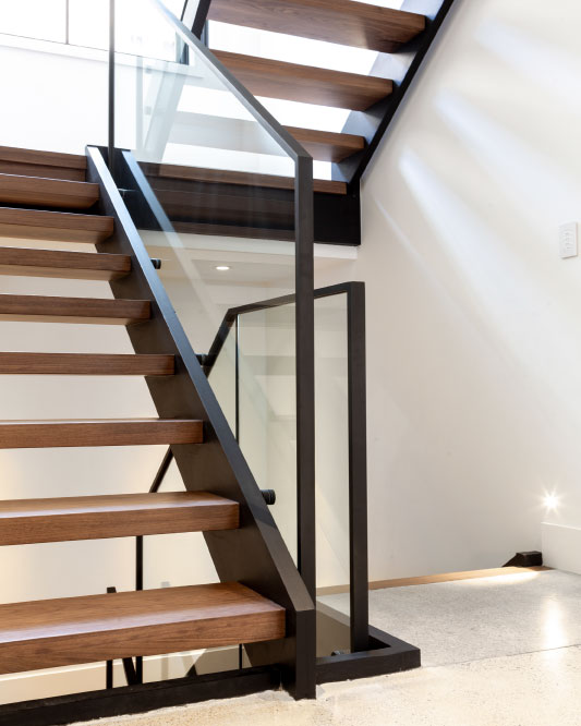 side stringers / black anodized aluminum stringers / box steps / glass top mount handrails / anodized aluminum handrails