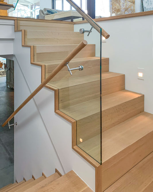 waterfall stair / glass side mount handrails / round wood handrails