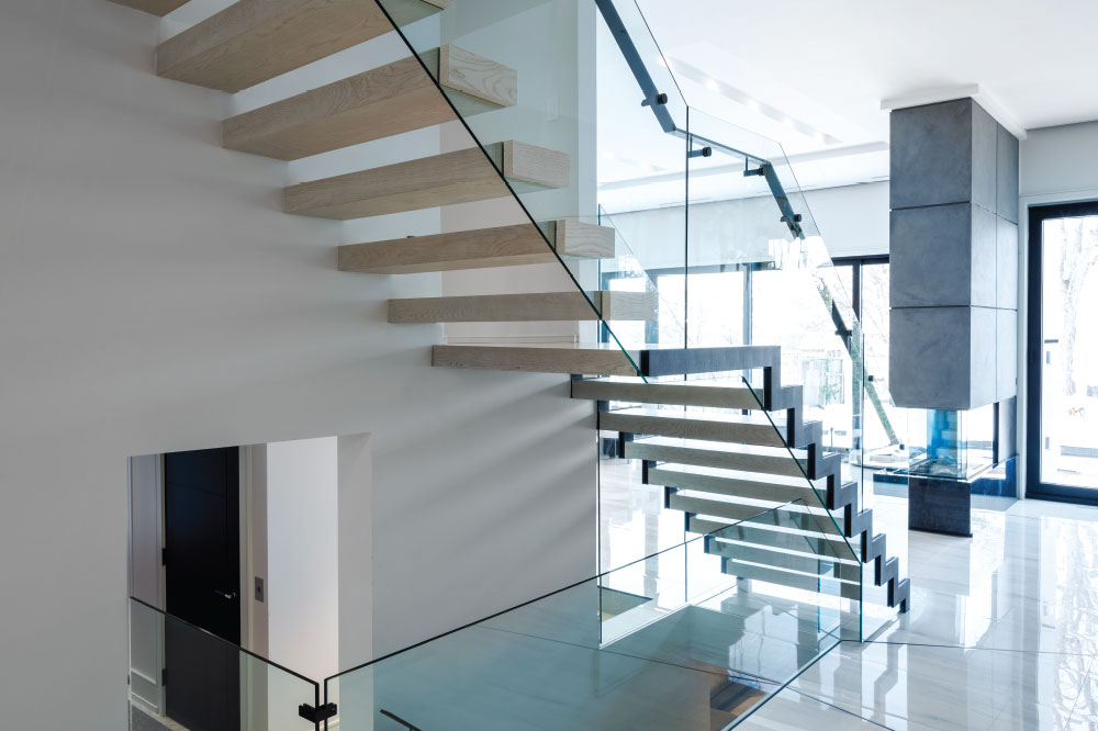 zig-zag and cantilevered stair / glass side mount handrail / rectangular painted aluminum handrails